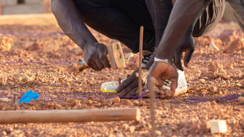 Burkina Faso Team Member Installing Foundations Markers Photo By Kr Architecture